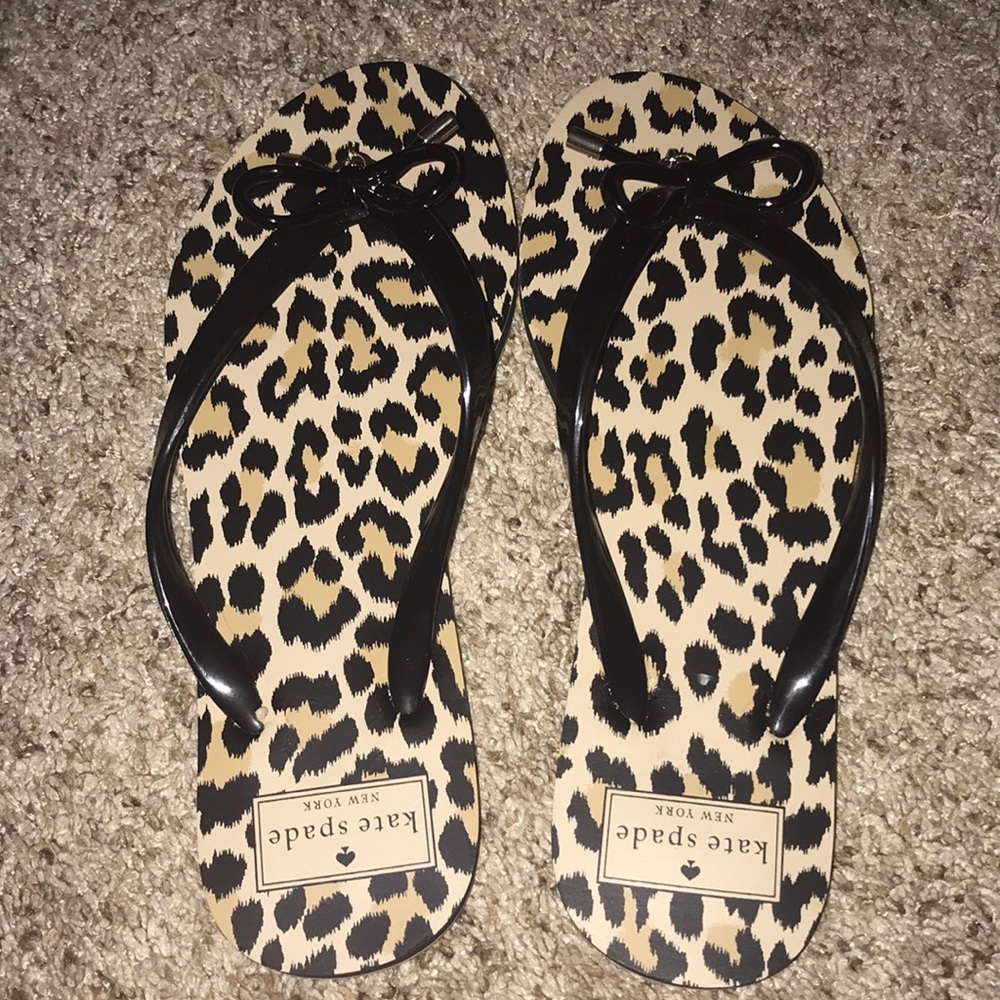 Kate Spade cheetah print flip flops. Size 7